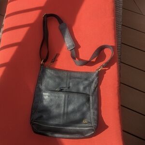 Black leather purse by the Sak